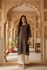 Model with ivory trousers and chandelier earrings